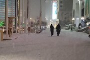تصاویر بارش شبانه برف در مشهد + فیلم