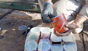 جاسازی حرفه ای حشیش و شیشه داخل قوطی‌های رب گوجه فرنگی! + تصاویر | لحظه کشف در گمرک