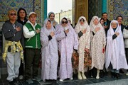 تصاویر جالب از حجاب زنان گردشگران چینی در حرم امام رضا(ع) | تصاویر
