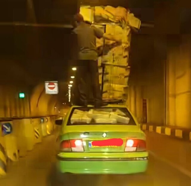 بابري با تاكسي در محدوده بازار تهران