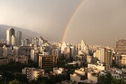تصاویری از رنگین کمان زیبا در تهران پس از باران بهاری