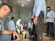 تلاش کارگران نیروگاه بندرعباس در گرمای شدید هوا | ویدئو