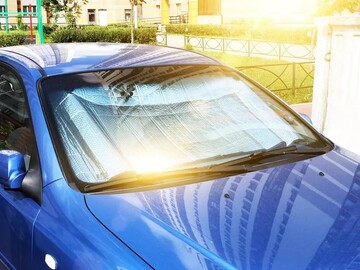 طرز صحیح استفاده از آفتاب‌گیر شیشه جلو ماشین | با این روش دمای داخل ماشین ۲۰ درجه پایین می‌آید !