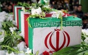 تصویر شهید محمد مهدی شاهرخی فر که در دفاع در مقابل حملات اسرائیل به شهادت رسید