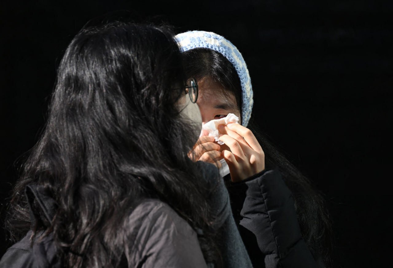 ادای احترام مردم کره جنوبی در محل یادبود قربانیان سقوط هواپیمای مسافربری | تصاویر