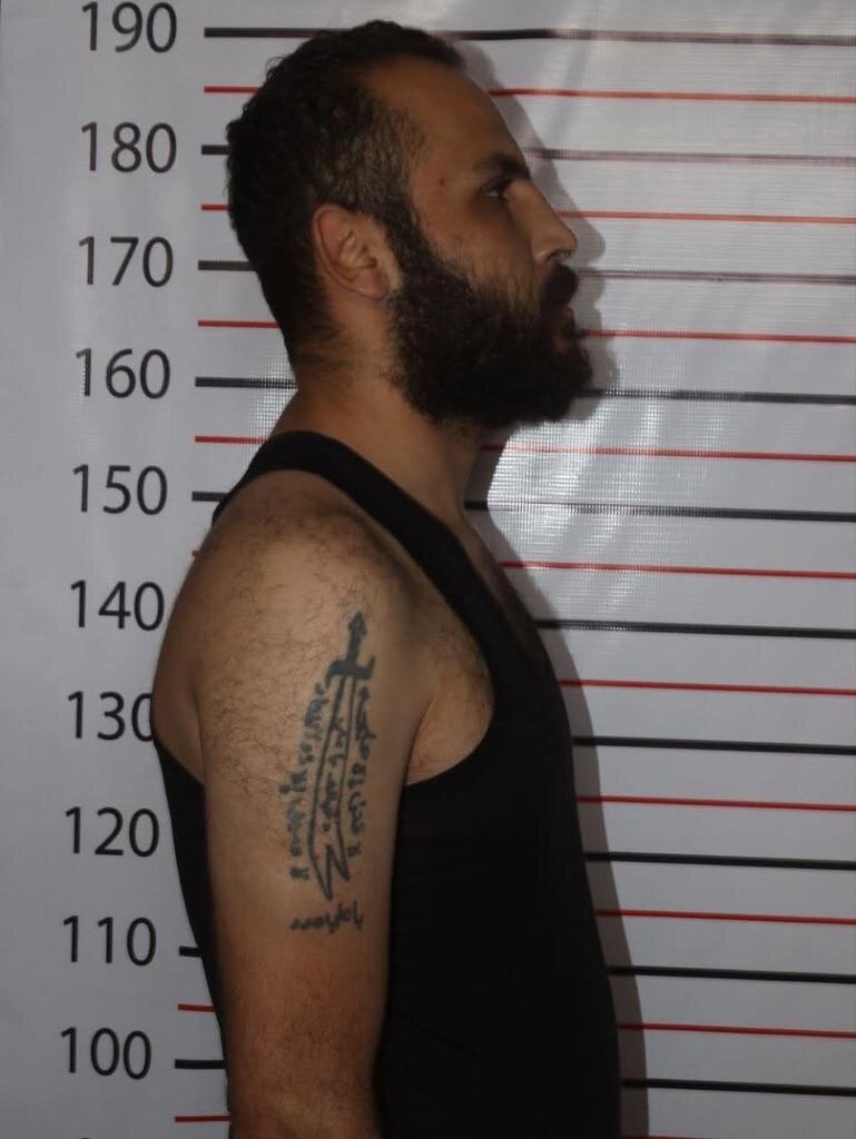 خالکوبی تصویر شهید سلیمانی روی دست مقام سابق سوری | تصاویر