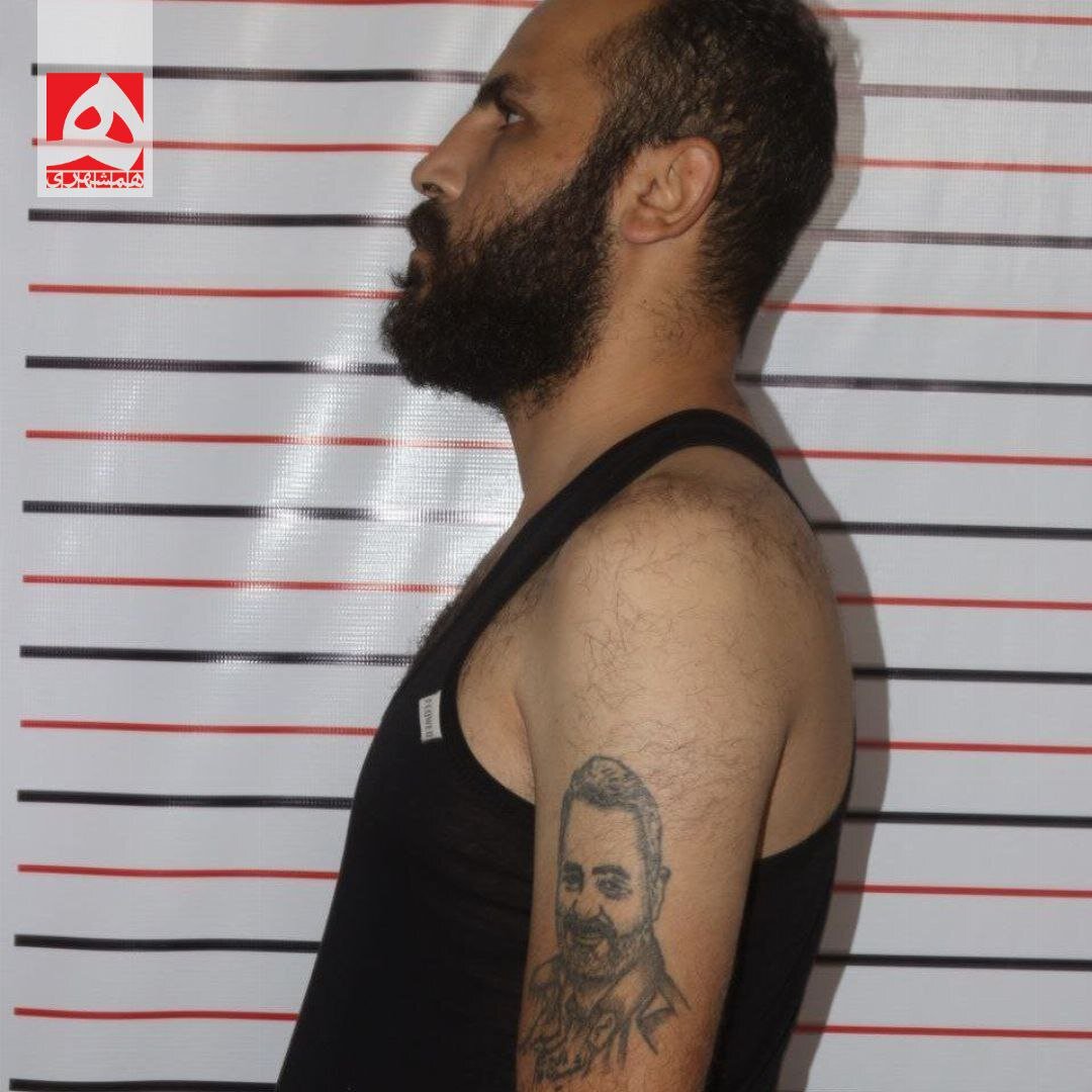 خالکوبی تصویر شهید سلیمانی روی دست مقام سابق سوری | تصاویر