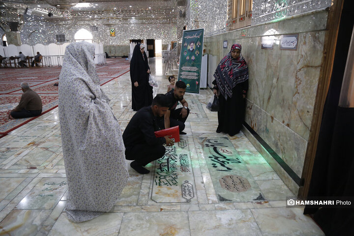 حضور مردم در کنار مزار شهید امیرروزانه مردم  عبداللهیان