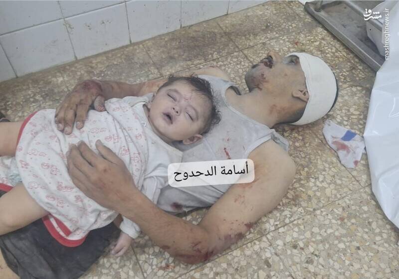 غمانگیزترین آغوش پدرانه | عکس