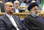 تصویری متفاوت از نماز خواندن شهید سید ابراهیم رئیسی و شهید حسین امیرعبداللهیان