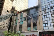 آتش گرفتن دفتر اسناد رسمی در ستارخان | حضور زنان آتش‌نشان در عملیات اطفا + عکس
