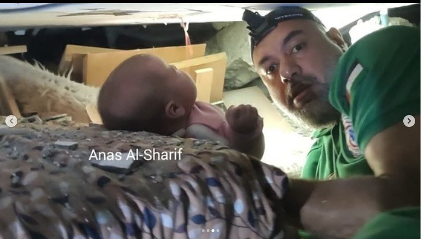 لحظه نجات جان یک نوزاد از زیر آوار | تصاویر