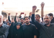 تصاویری از صلابت همسر شهید محمدرضا امیرخانی در آیین تشییع همسرش