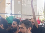 پیچیده شدن پیکر شهید خردسال با پرچم ایران + ویدئو