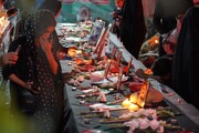 میدان ۶ در سوگ شهدای جنگ ۱۲ روزه روشن شد+ تصاویر