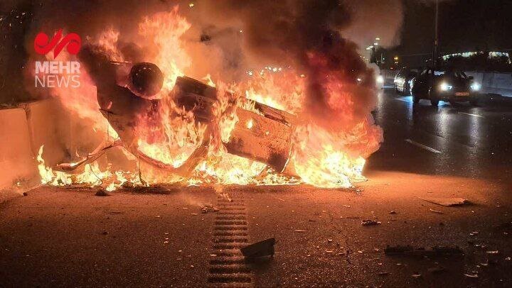 حریق هولناک خودرو ۲۰۶ در بزرگراه تهران ـ قم | راننده در آتش سوخت + عکس