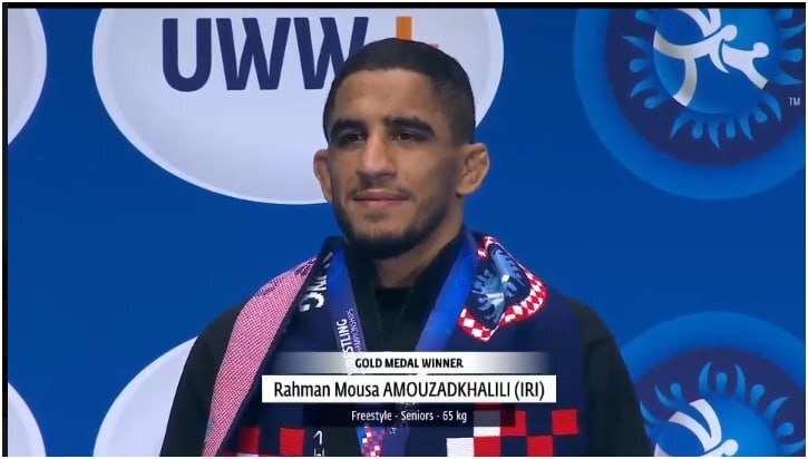 تصاویری از لحظه اهداء مدال طلا به رحمان عموزاد | دور افتخار رحمان عموزاده با پرچم ایران