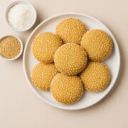 آموزش تهیه شیرینی کنجدی نارگیلی