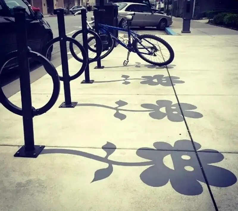 آثار هنری بامزه در خیابان‌های جهان؛ از گدایی مرد نامرئی تا پارکینگ تمساح | عکس