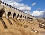 تصاویر آبگیری این سد پس از طغیان رودخانه؛ شدت عبور آب از زیر پل را ببینید