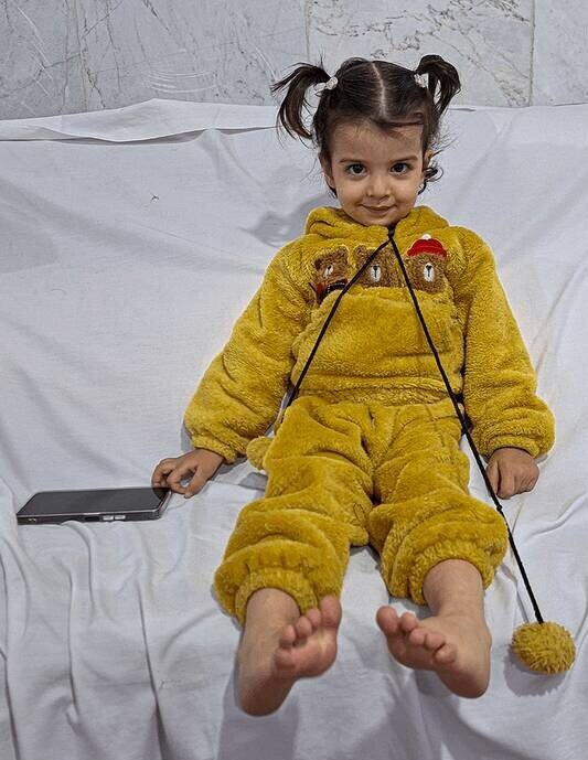 کاپشن صورتی دیگر؛ ملینای ۳ ساله که تروریست‌ها جانش را گرفتند | تصاویر