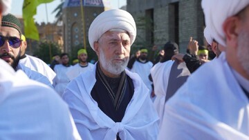 رزمندگان حزب الله عراق برای حمایت از ایران کفن پوش شدند+ تصاویر | نام نویسی آنها برای مبارزه را ببینید