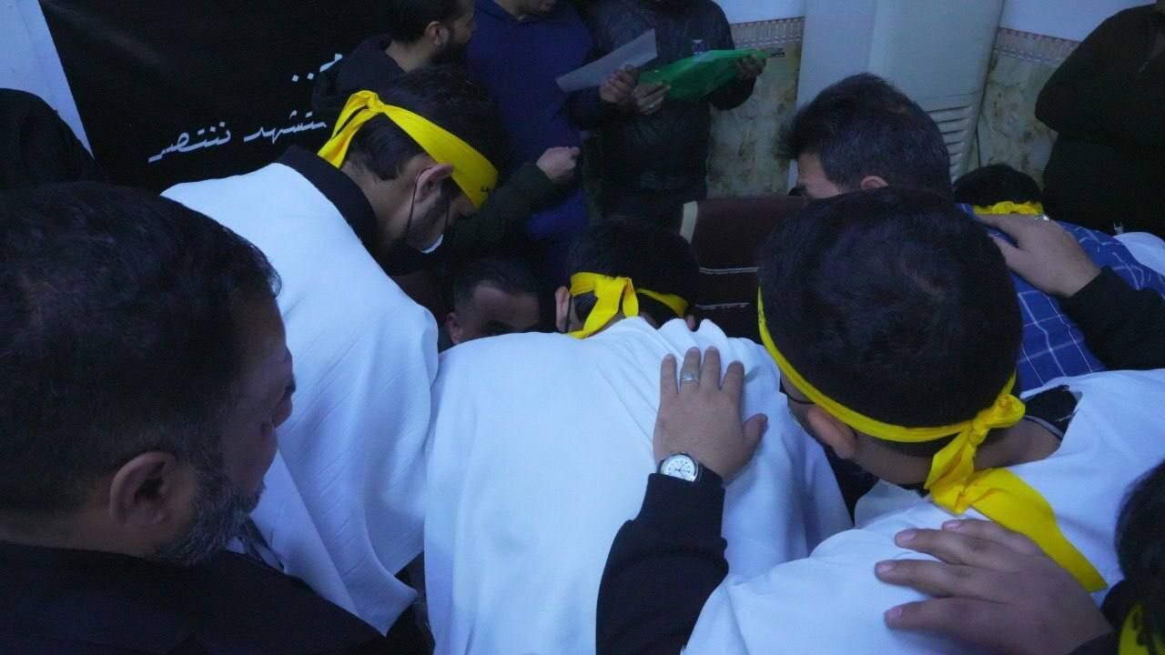 رزمندگان حزب الله عراق برای حمایت از ایران کفن پوش شدند+ تصاویر | نام نویسی آنها برای مبارزه را ببینید