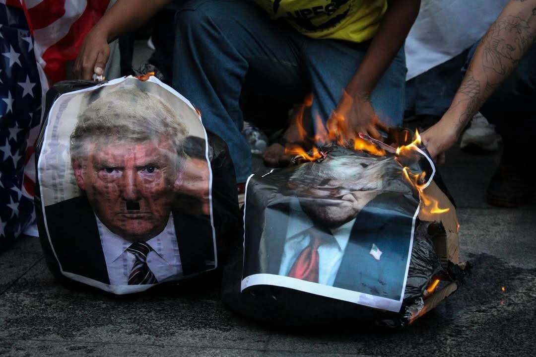 عکس سردار سلیمانی و پرچم ایران در دست برزیلی ها؛ عکس ترامپ را به کشیدند | تصاویر