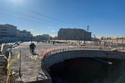 تکمیل عرشه زیرگذر تقاطع بزرگراه حکیم-تعاون در غرب تهران