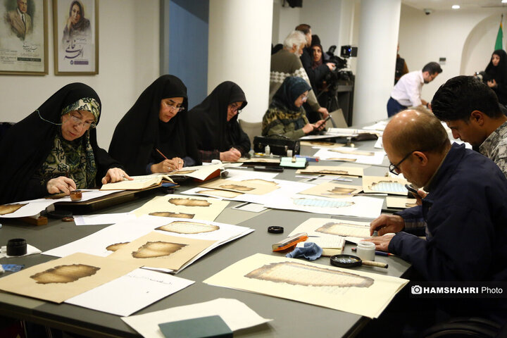 مرمت قرآن های سوخته در رویداد "آیه های ماندگار"