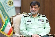 تصویری قدیمی از سردار رادان با لباس کردی در جبهه