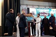 تجلیل  از بازماندگان و شهدای ناوشکن دنا در فرهنگسرای قرآن