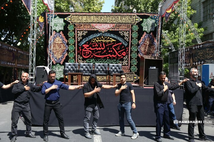 آیین خیمه سوزان عاشورا در چهارراه گلوبندک تهران