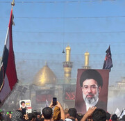 تصویر رهبر انقلاب در دستان عزاداران  طویریج کربلا