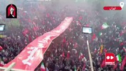 ترامپ را می‌کشیم؛ نوشته روی بنر چند متری در دستان مردم