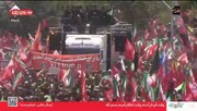ترامپ را بکشید + ویدئو | نوشته خاص پلاکارد جلوی خودرو حمل پیکر رهبر شهید