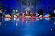قاب‌هایی جدید از رواق دارالذکر؛ دکتر حداد عادل و همسرش بر سر مزار فرزند شهیدشان | ببینید