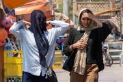 دمای بالای ۵۰ درجه، جنگ و زندگی در اهواز | تصاویر
