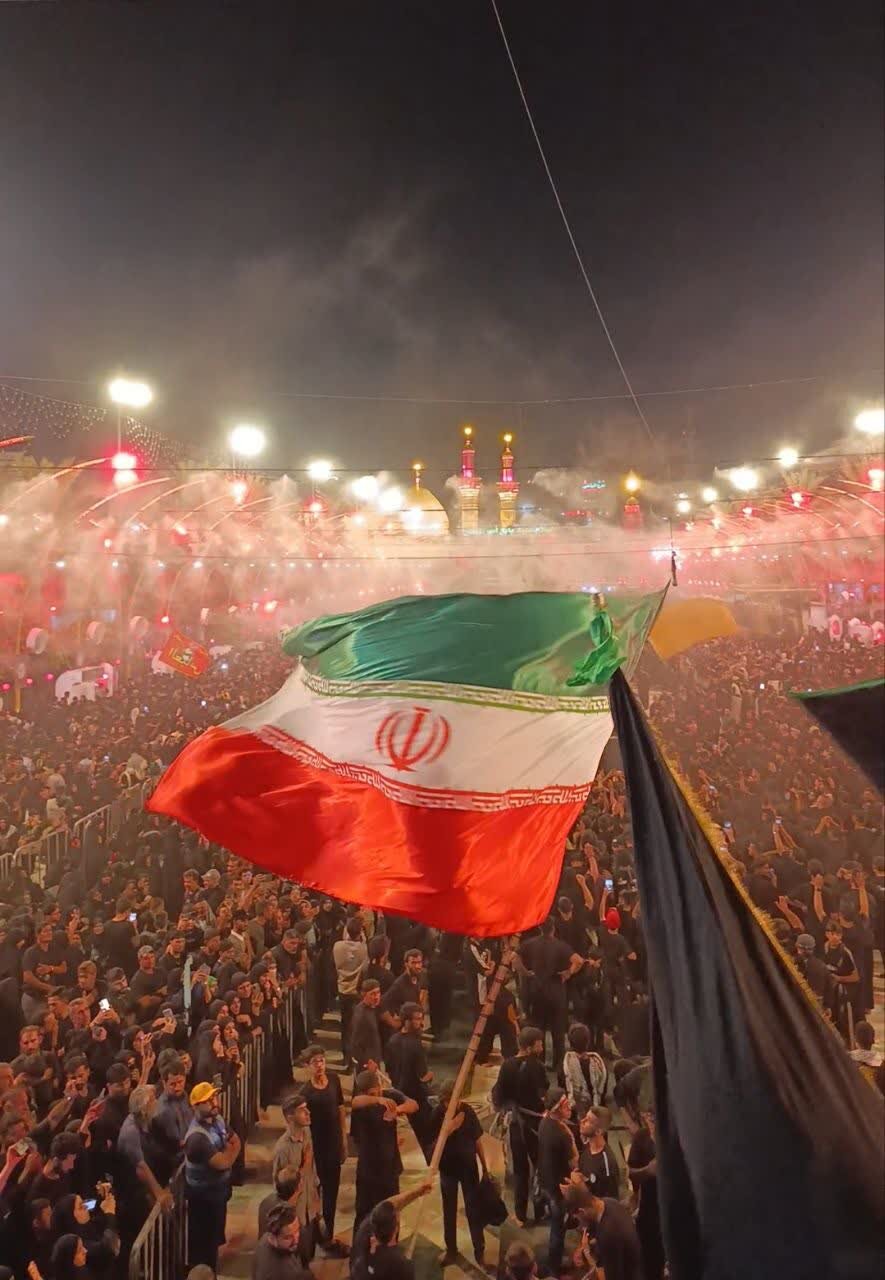 تصویری زیبا از برافراشته‌شدن پرچم ایران در بین‌الحرمین