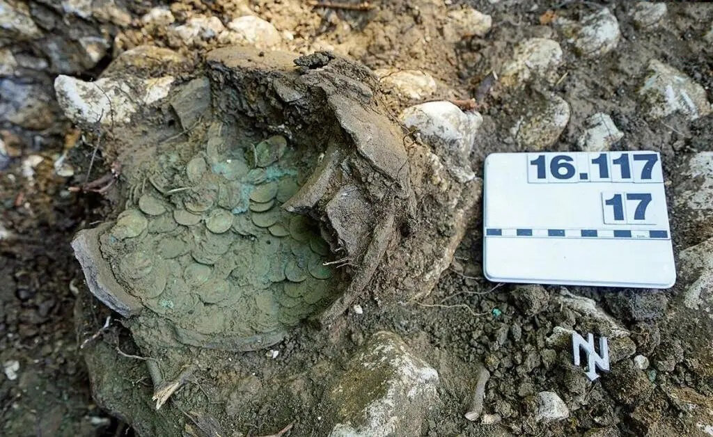 1290 Roman coin with a piece of cowhide; Switzerland
