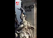 پوشاندن لباس خاص بر تن مجسمه غول پیکر +‌ ویدئو | تصاویر آخرالزمانی از اعتراضات و غارت فروشگاه‌ها
